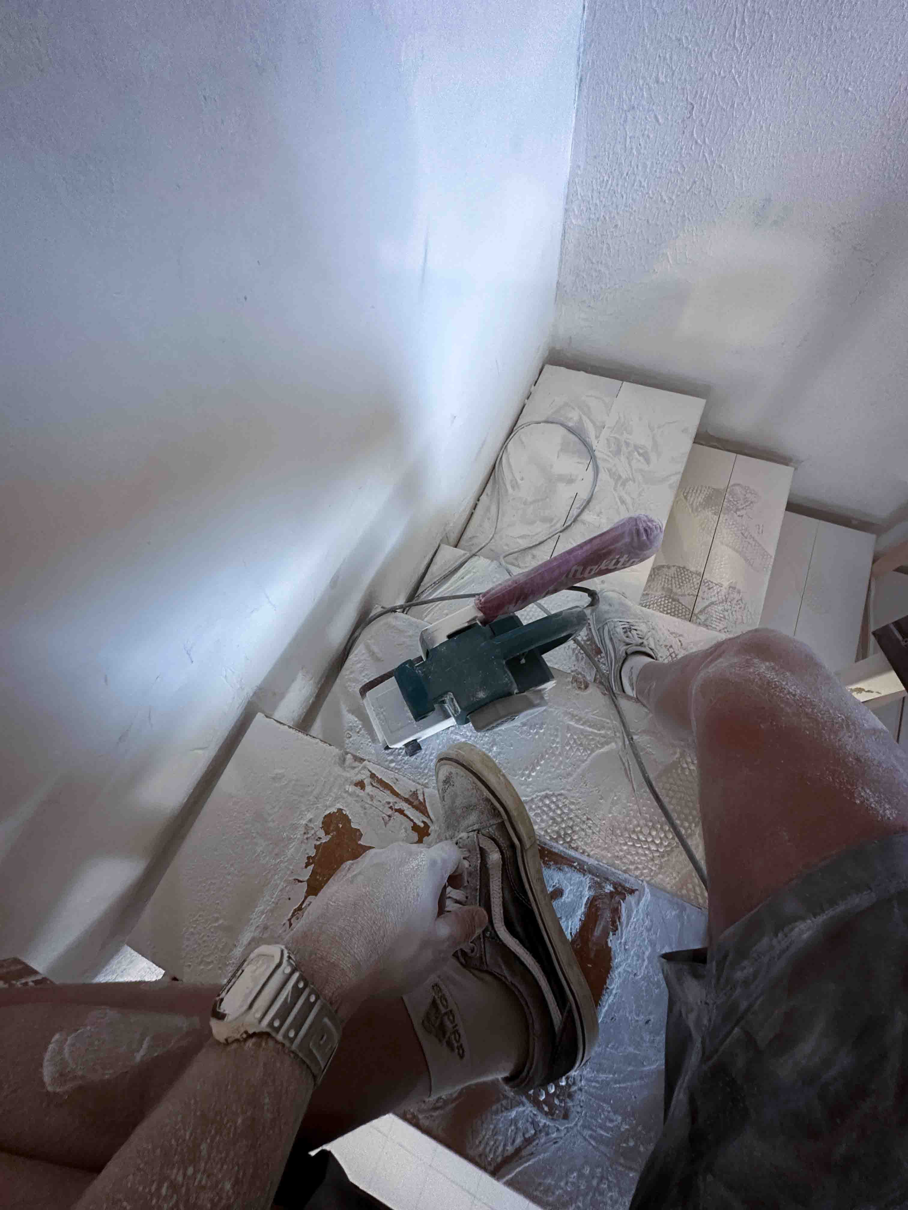 Staircase sanding walls